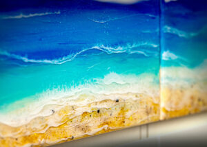 Close-up of the resin waves and beach in piece #1